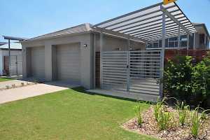 The finished product is a reinforced lawn surface suitable for vehicle parking year round.