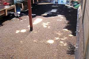 The hexagonal cells are filled with gravel.